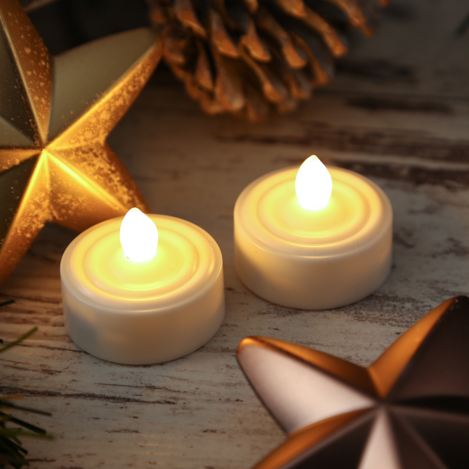 LED Teelichter - warmweiß flackernde Flamme - inkl. Batterien - Timer - D: 3,6cm - weiß - 12er Set