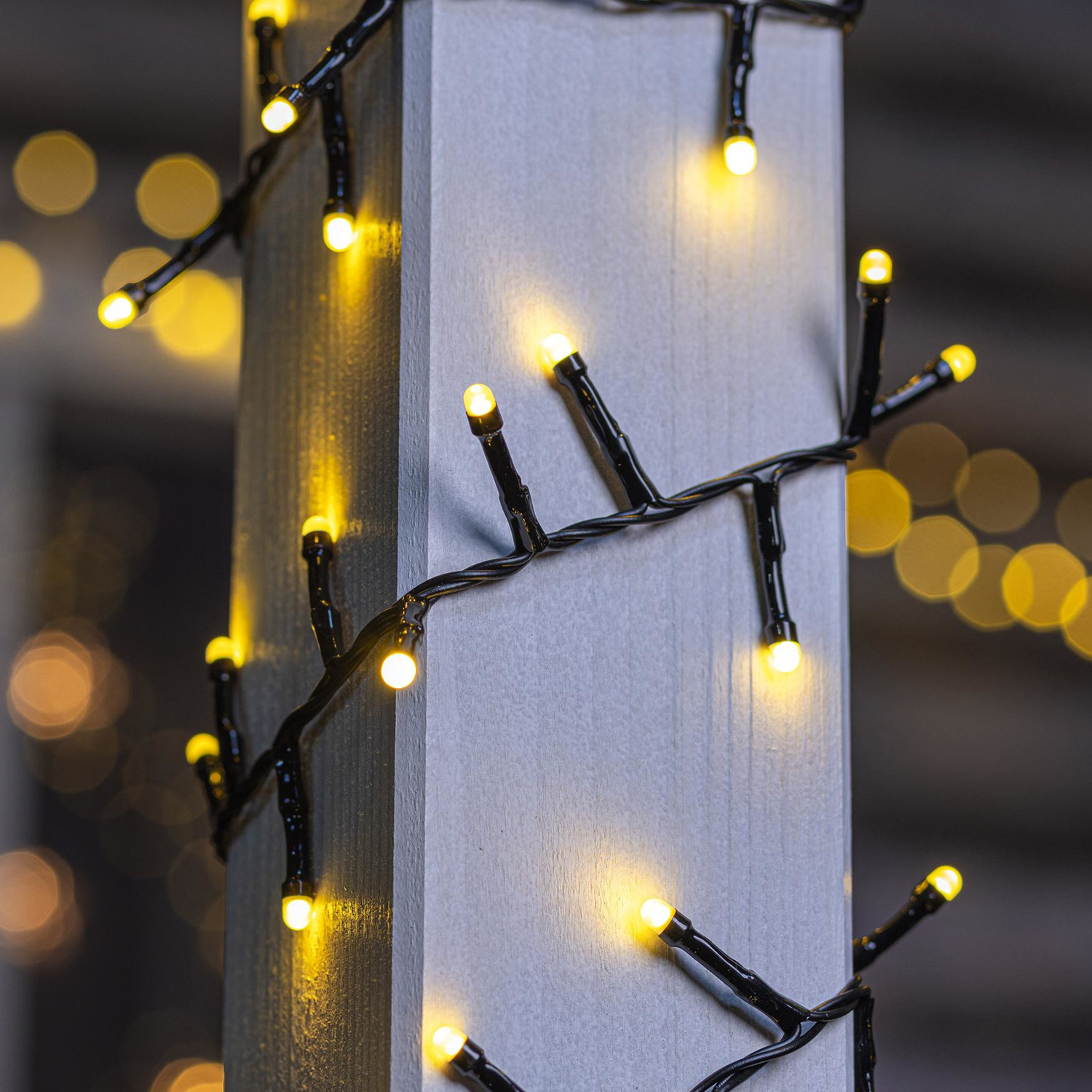 LED Lichterkette mit Kabelaufroller - 1000 warmweiße LED - L: 20m - Außen - Trafo - schwarz