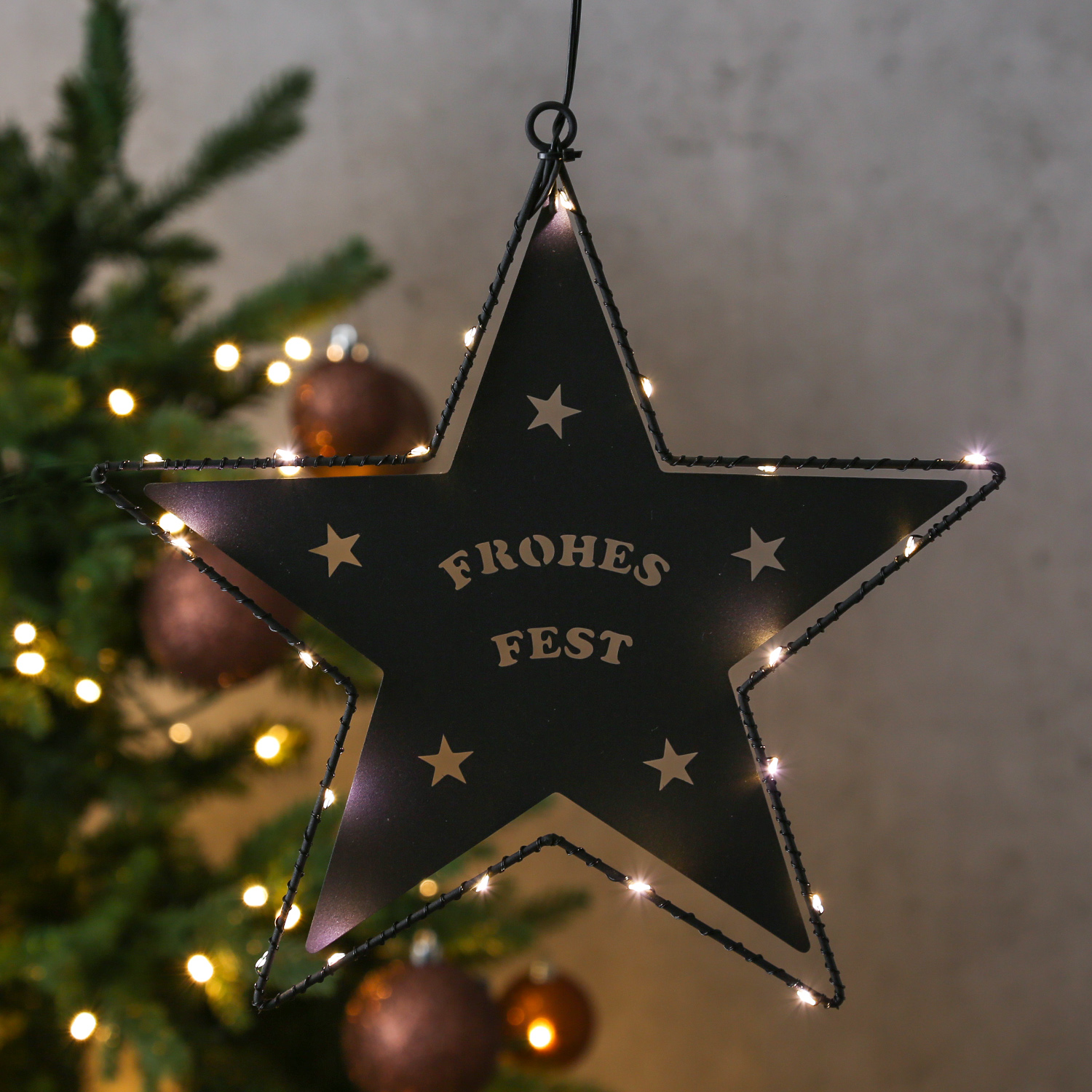 LED Hängestern FROHES FEST - Metallstern - 5-zackig - D: 27cm - 20 LED - Batteriebetrieb - schwarz