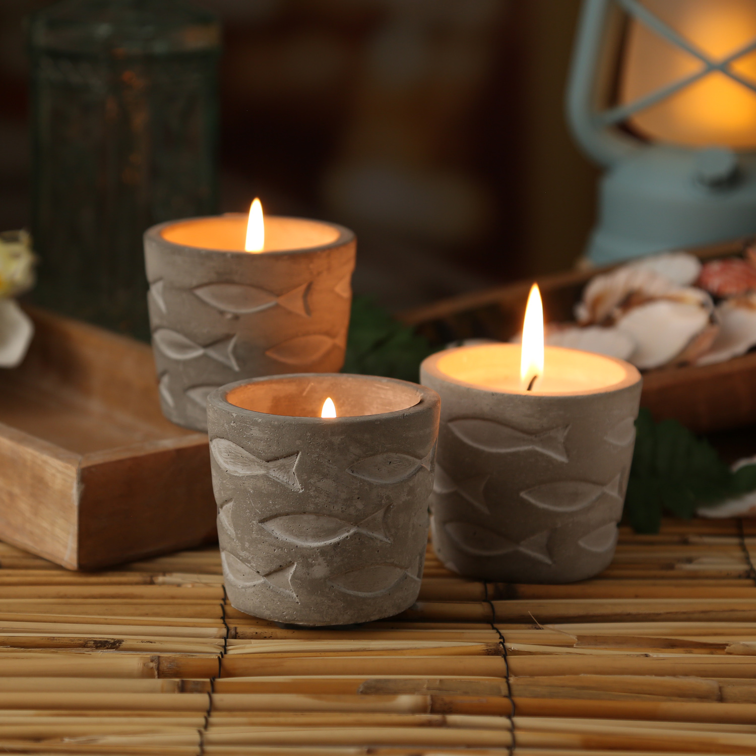 Duftkerze CITRONELLA - Echtwachs in Betontopf - Fischmuster - H: 7cm - gegen Stechmücken - blau