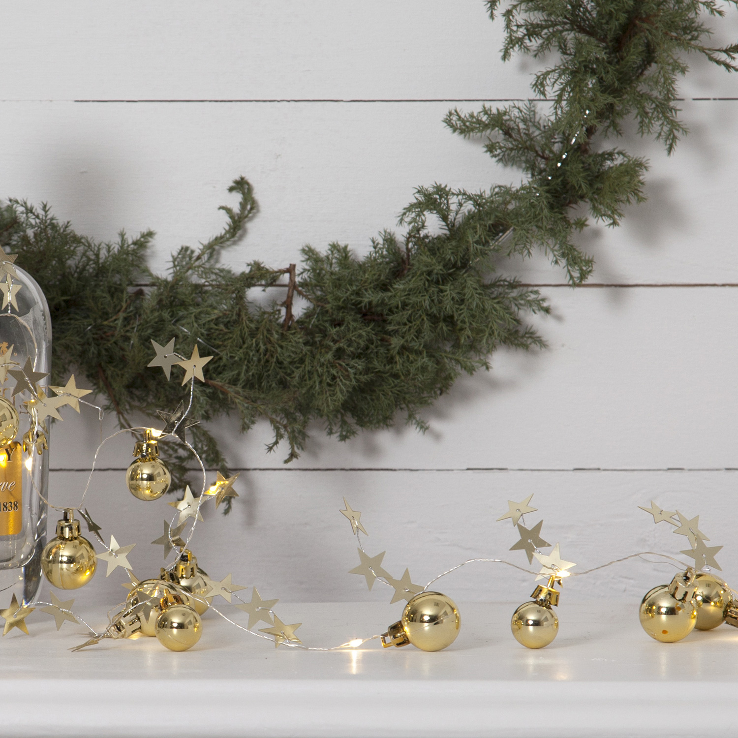 LED-Lichterkette "Xmas" - 10 warmweiße LED - goldene Kugeln und Sterne - 0,9m - Batterie - Timer