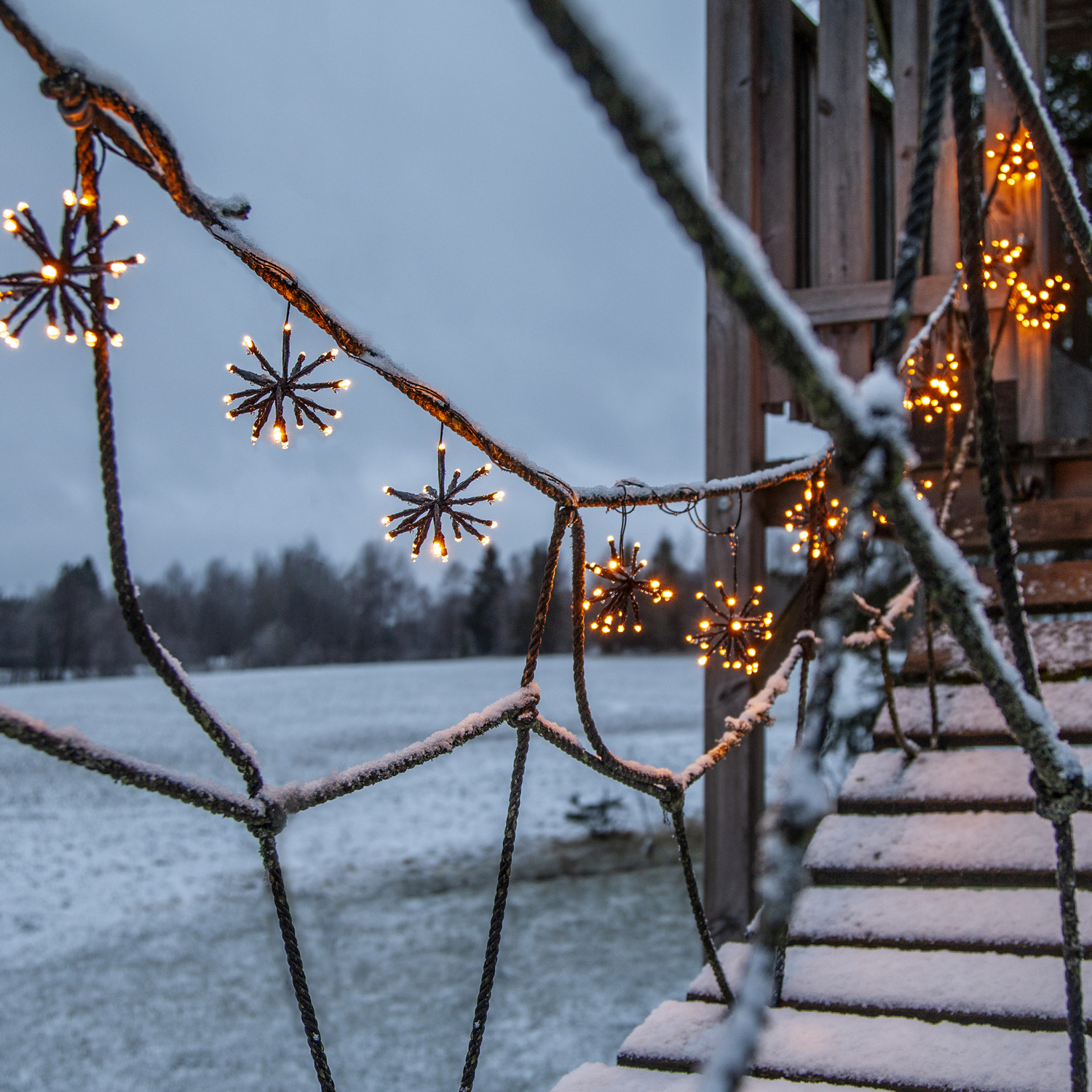 LED Lichterkette Feuerwerk - 200 bernsteinfarbene LED - 10 Cluster - L: 4m - Trafo - Außen - schwarz