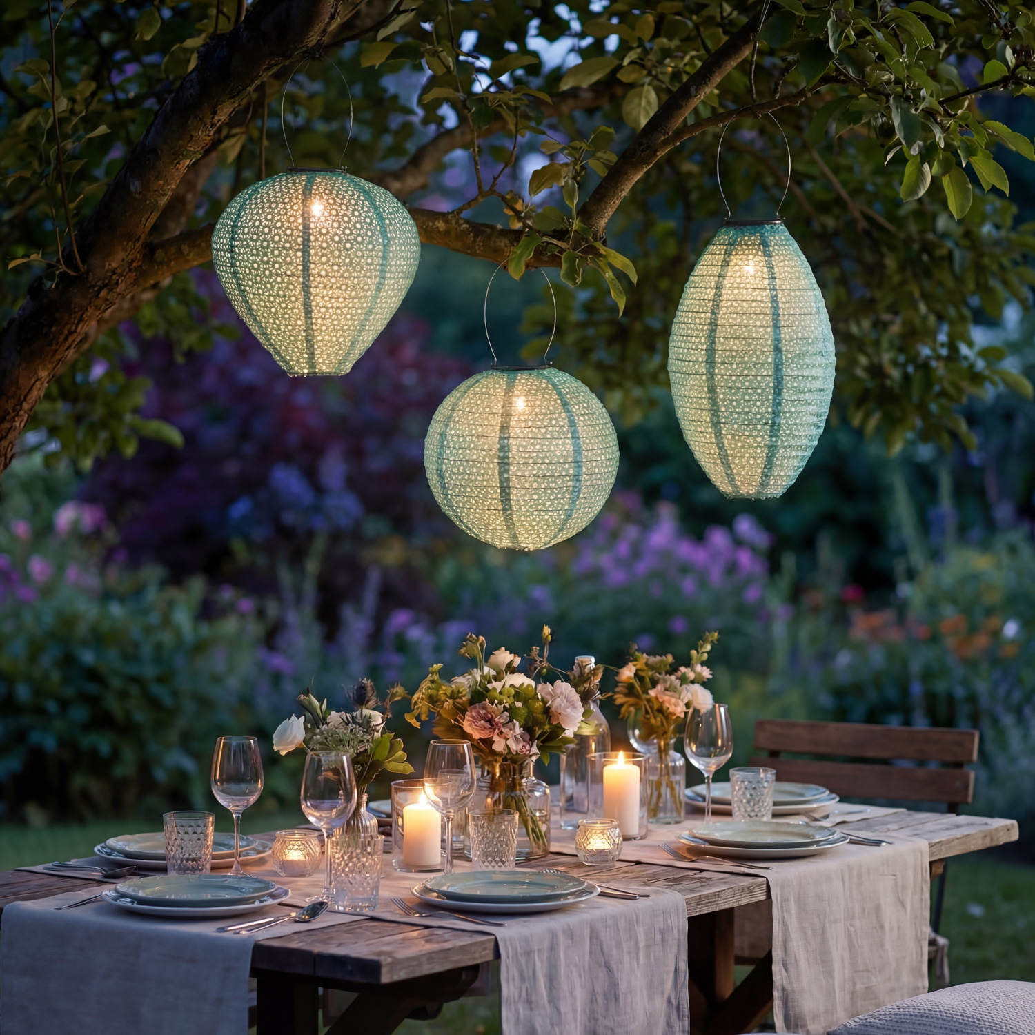 LED Solar Lampions mit Blumenmuster - oval/rund/Ballonform - Lichtsensor - grün - 3er Set