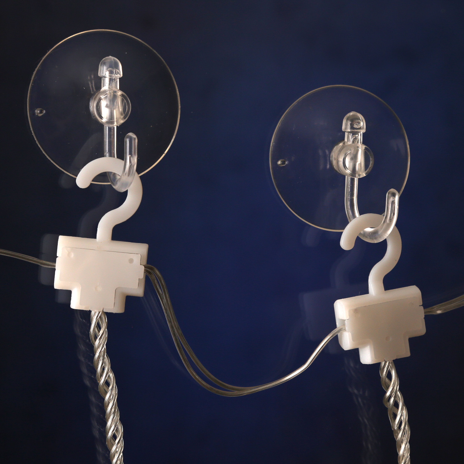 LED Lichtervorhang STERN - 8 kaltweiße LED - L: 0,9m - Timer - Batterie - Haken/Saugnäpfe - Außen