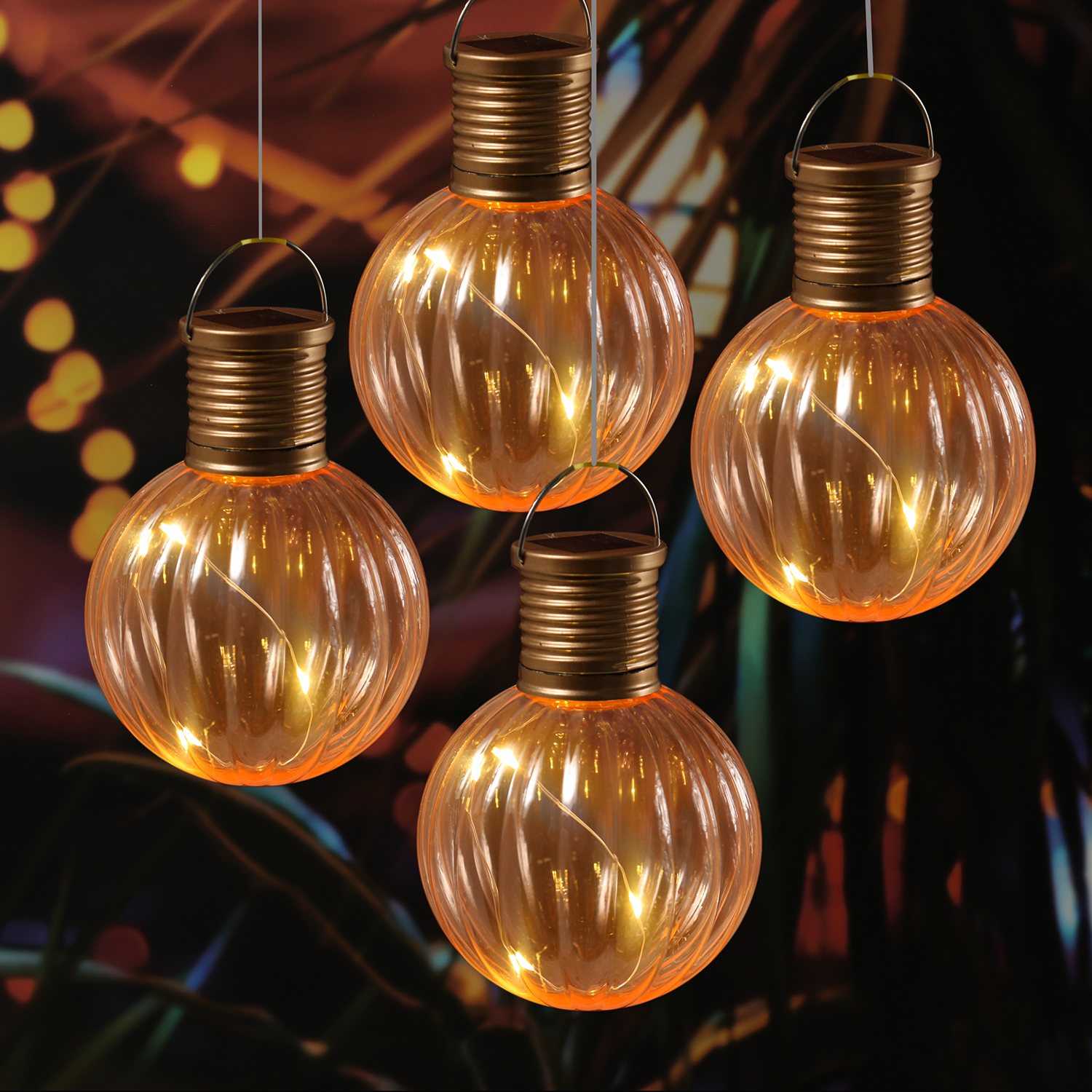 LED Solar Glühbirnen GLOW - Kugelleuchten - wamweiße LED - H: 11cm - Lichtsensor - orange - 4er Set