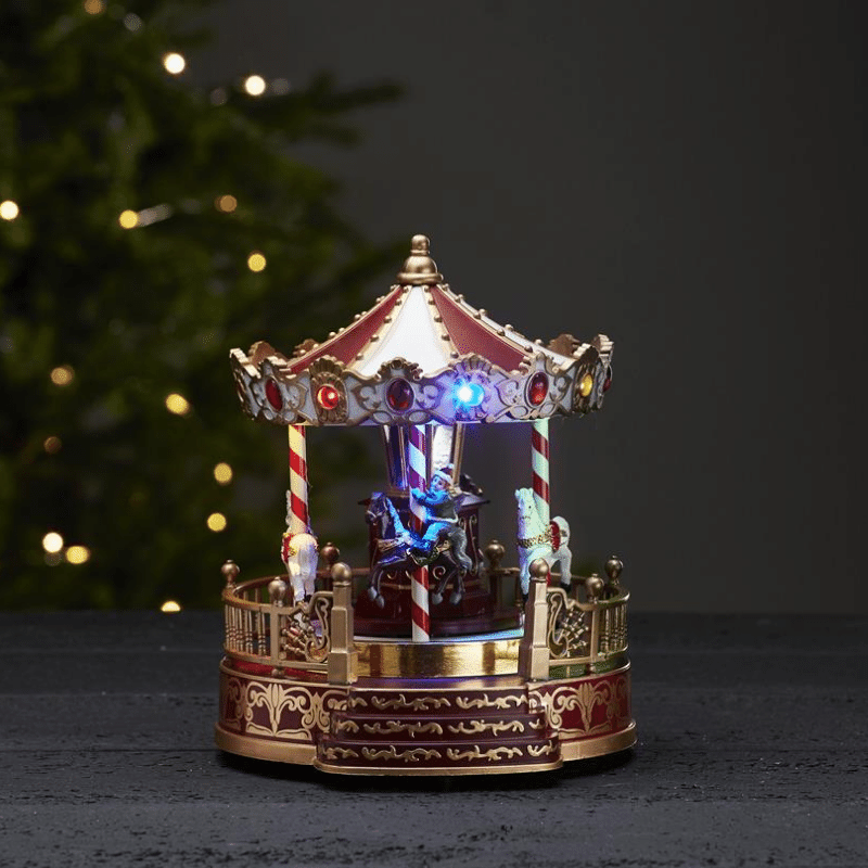 LED-Weihnachtskarussell "Kidsville" - mit Bewegung und Musik - 13 bunte LED - H: 22cm - Timer