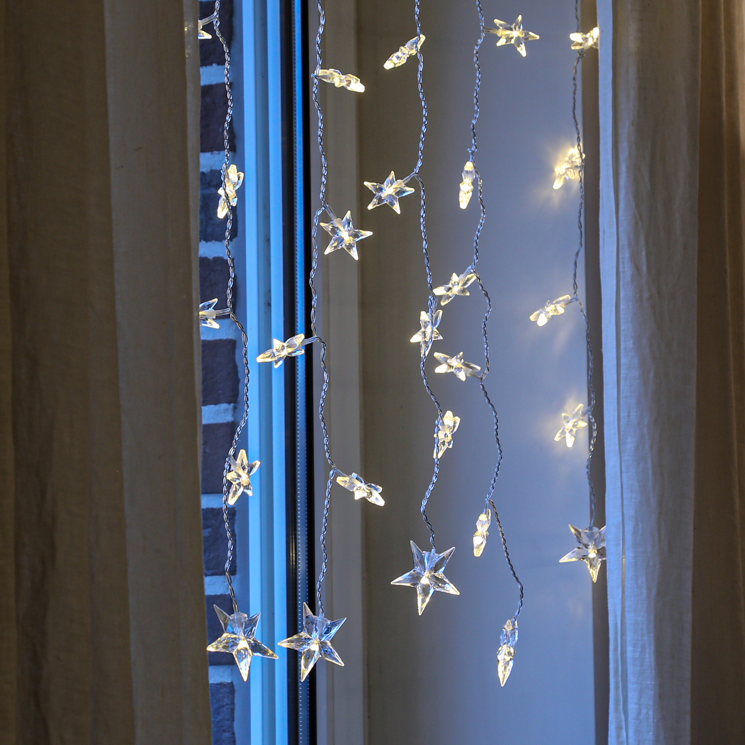 LED Lichtervorhang STERNE - 64 warmweiße LED - L: 1,2m - H: 1m - Trafo - für Innen - transparent