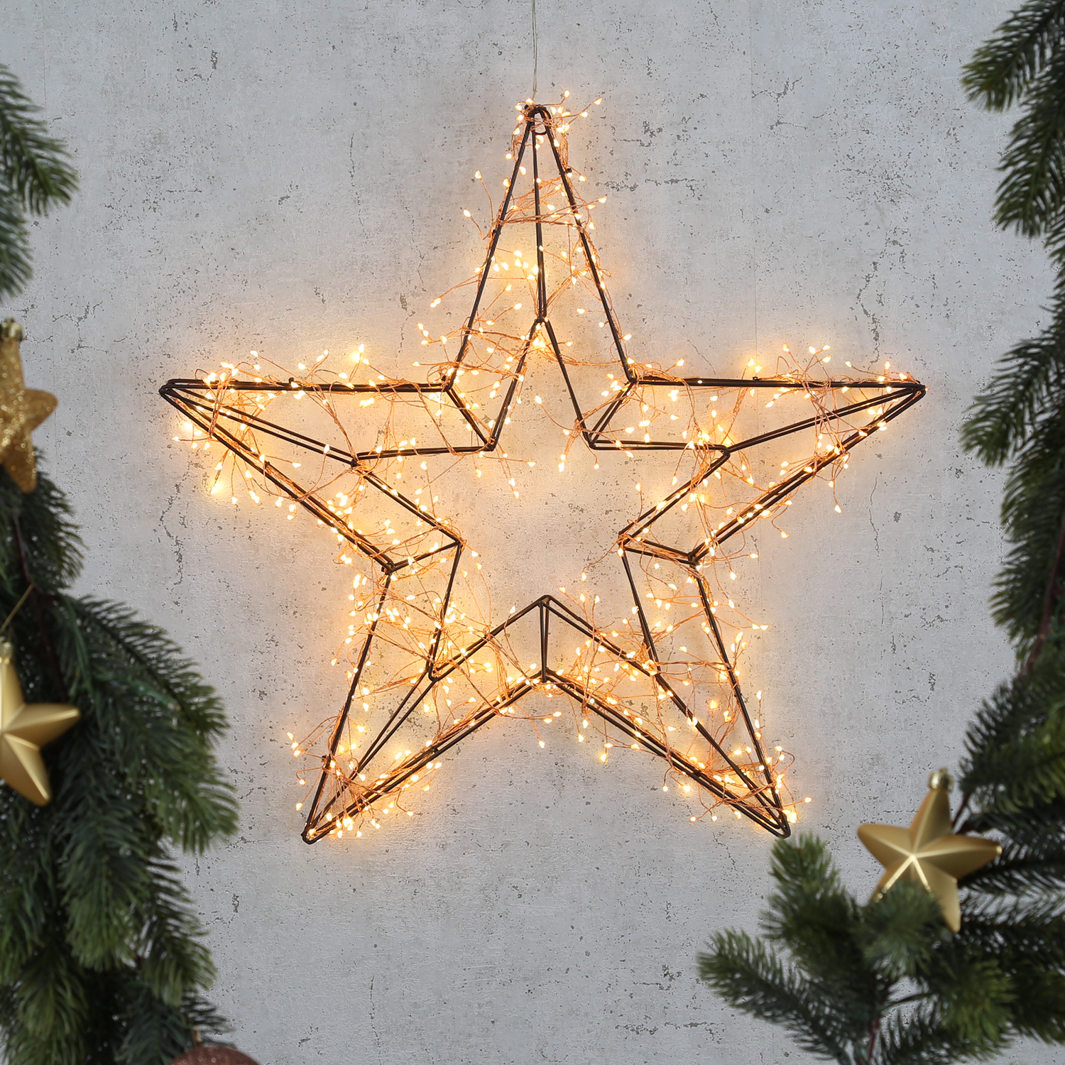 LED Metallstern - hängend - je 300 warmweiße/bernsteinfarbene LED - H: 58cm - Außentrafo - schwarz