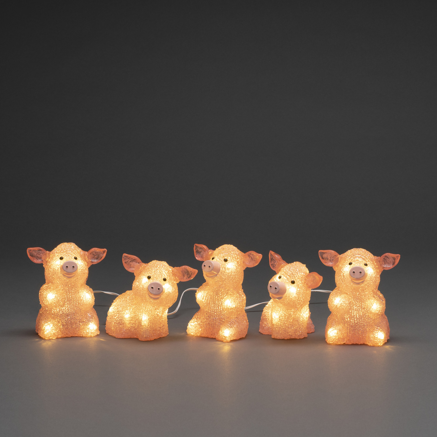 LED Lichterkette Acryl Schweine - 5 Leuchtfiguren - 40 warmweiße LED - Trafo - für Außen - pink