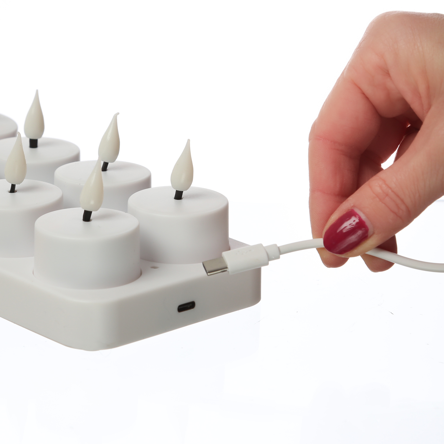 LED Teelichter - 8 wiederaufladbare LED Teelichter mit Ladestation - D: 4cm - flackernd - weiß