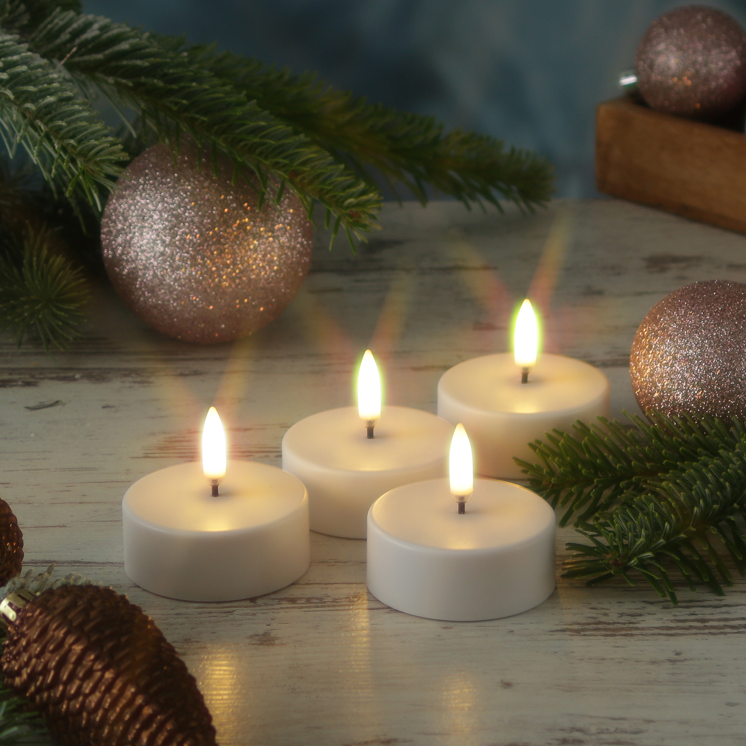 LED Maxi Teelichter - 4 wiederaufladbare LED Teelichter - D 6cm - Timer - weiß - für Außen