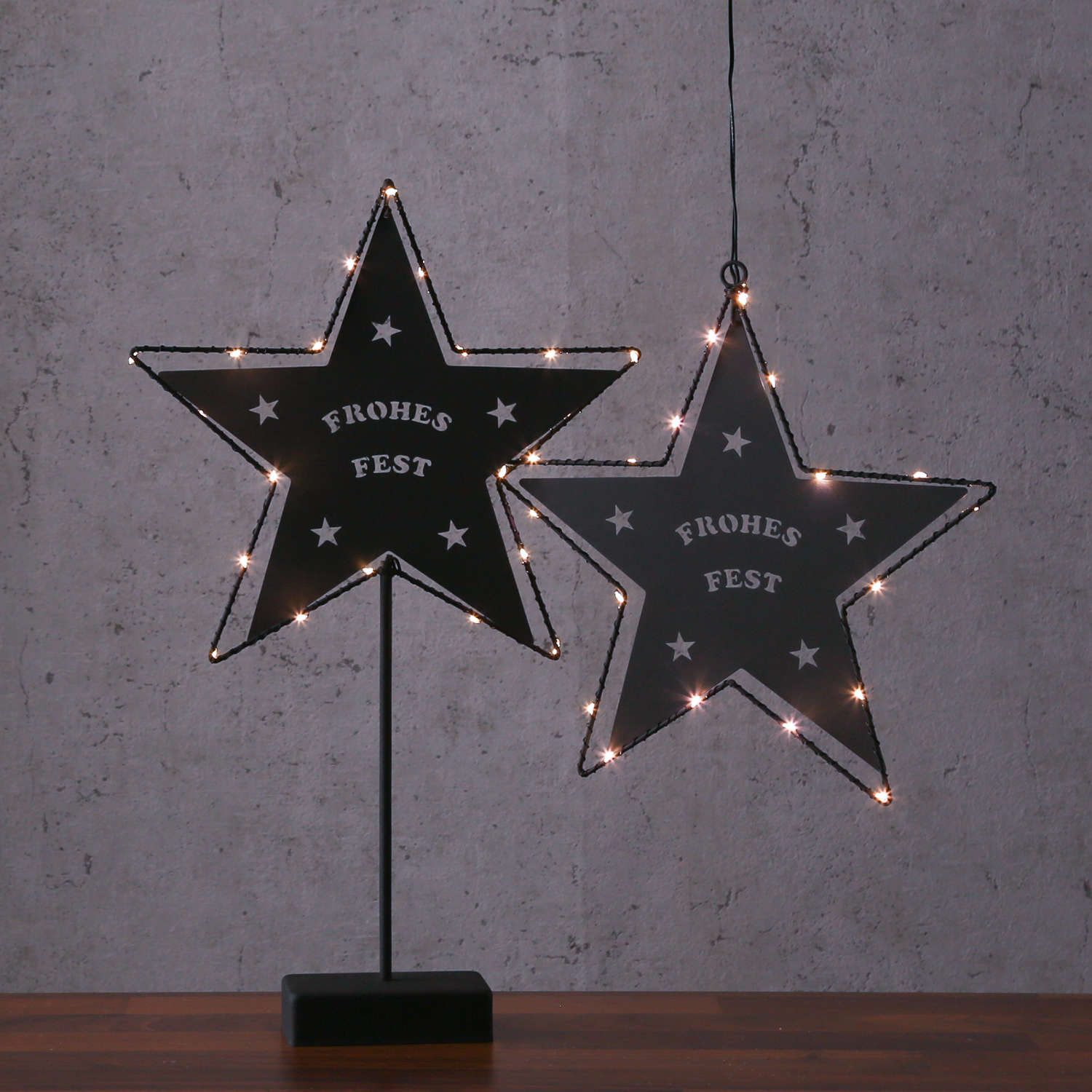 LED Stern FROHES FEST - Metallstern - stehend - 5zackig - H: 45cm - 20 LED - Batterie - schwarz