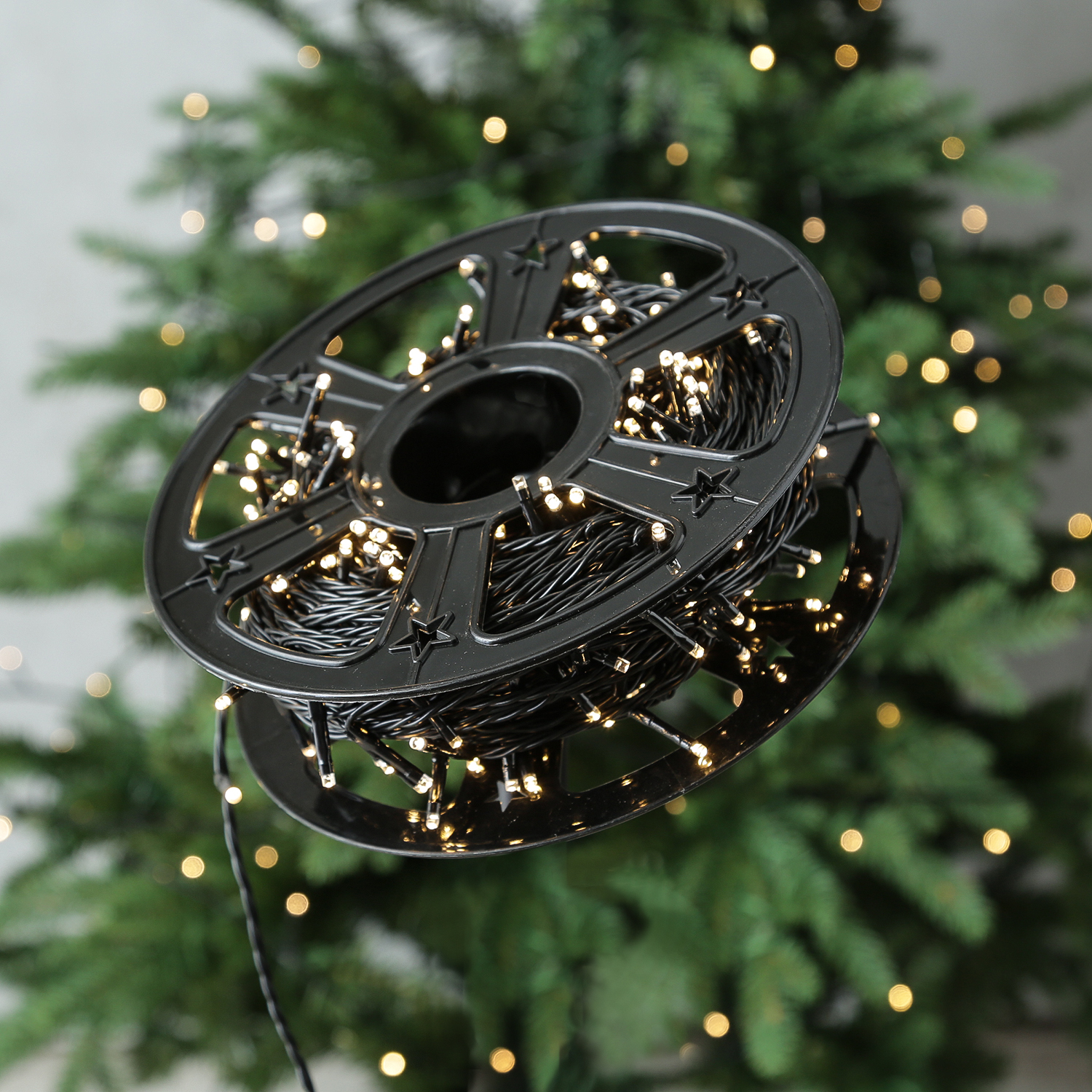 LED Lichterkette auf Kunststoffrad - 500 warmweiße LED - L: 50m - 8 Modi/ Timer - Innen/Außen