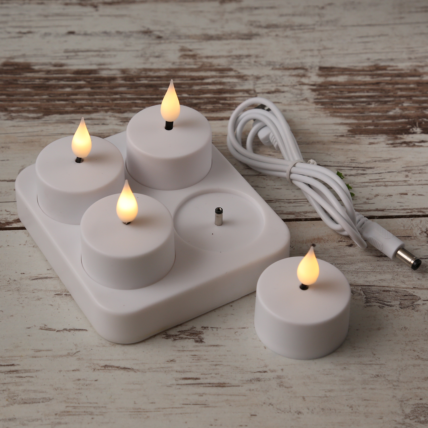 LED Teelichter - 4 wiederaufladbare LED Teelichter mit Ladestation - D: 4cm - flackernd - weiß