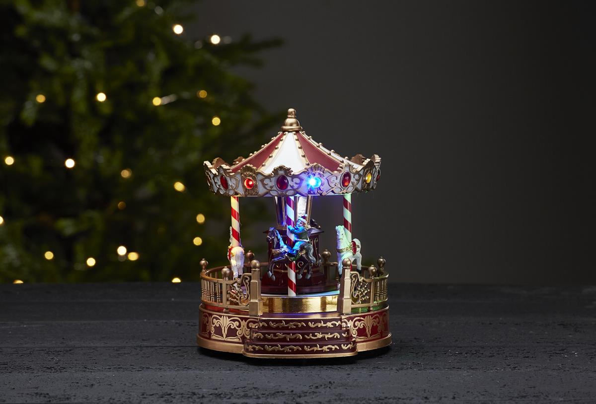 LED-Weihnachtskarussell "Kidsville" - mit Bewegung und Musik - 13 bunte LED - H: 22cm - Timer